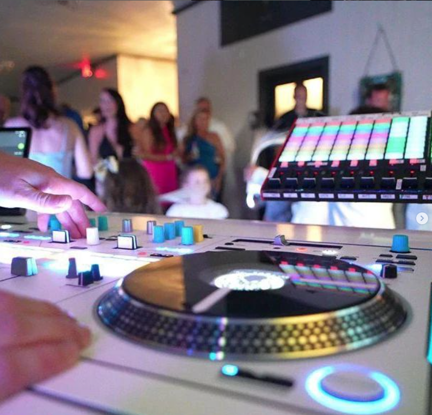 DJ setup with an AKAI midi controller to trigger QLC+